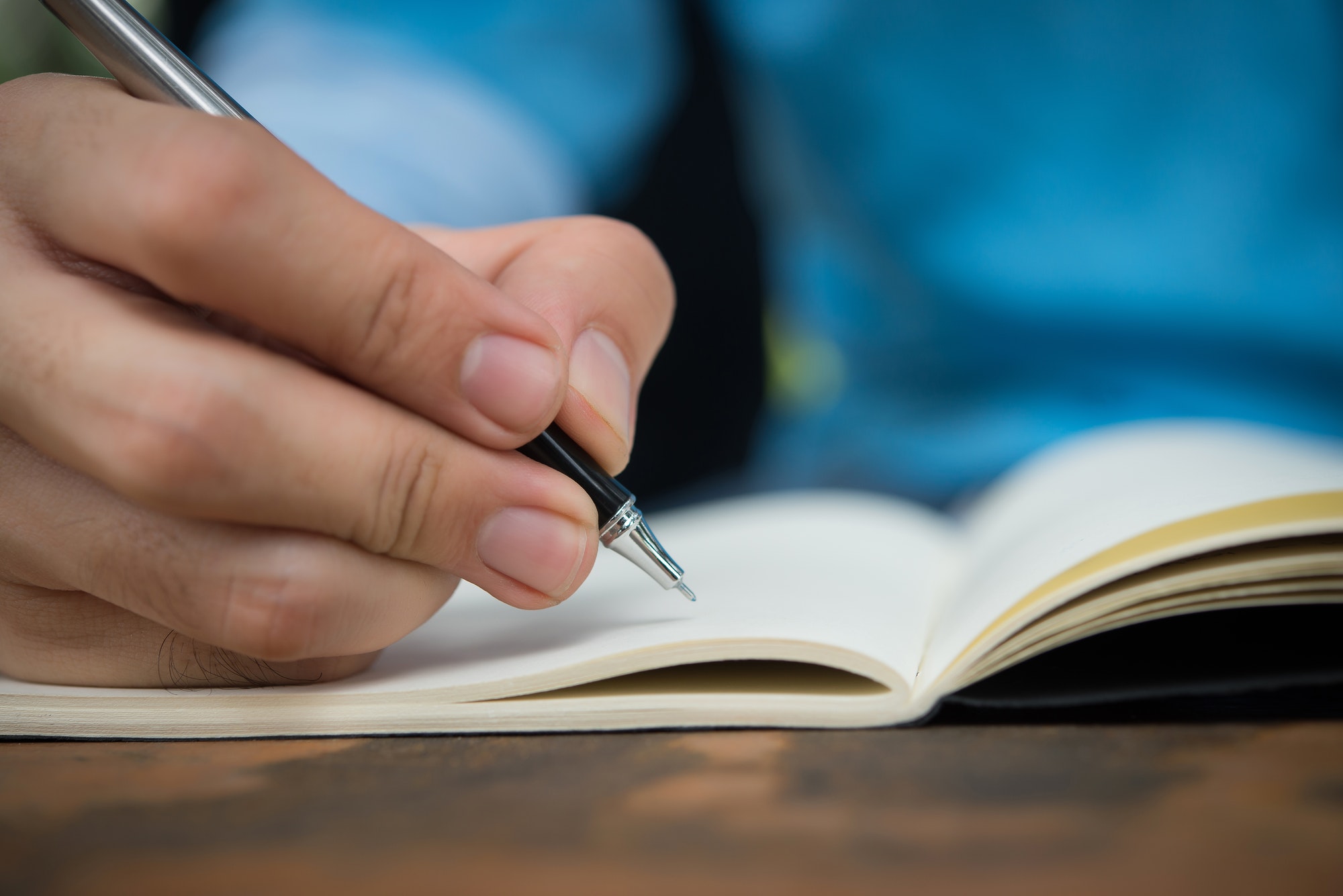 Man Hand write on the notebook. – Geek School Tutoring | 11 Plus ...